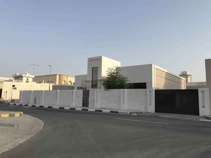 For sale villa in Al-Azra - modern finishing - has an extension – the exterior wall and the front of villa covered natural stone - on Qar Street, close to the public street - corner - great location