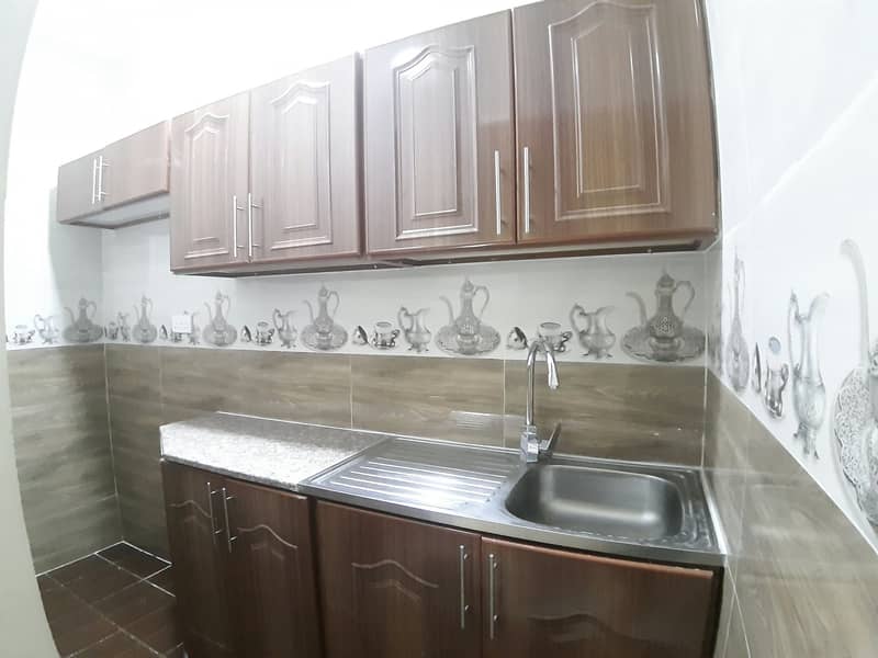 Monthly Rent 1Bhk Separate Big Kitchen Common Bath In Family Compound At MBZ City