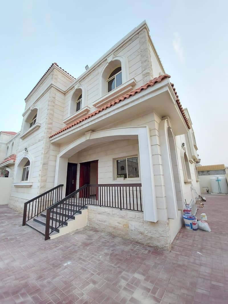 Stone front villa for rent in Ajman close to the neighbor street
