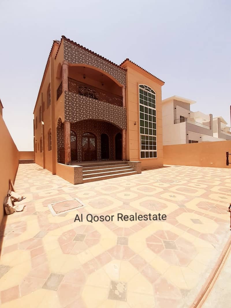 Villa for sale in Ajman, Al Mowaihat, excellent location, super deluxe finishing with the possibility of bank financing