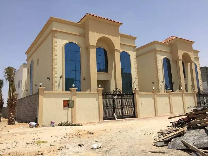 For sale luxury and distinctive villa with water and electricity on the asphalt street with a very large building area for those with good taste very close to Sheikh Mohammed bin Zayed Street