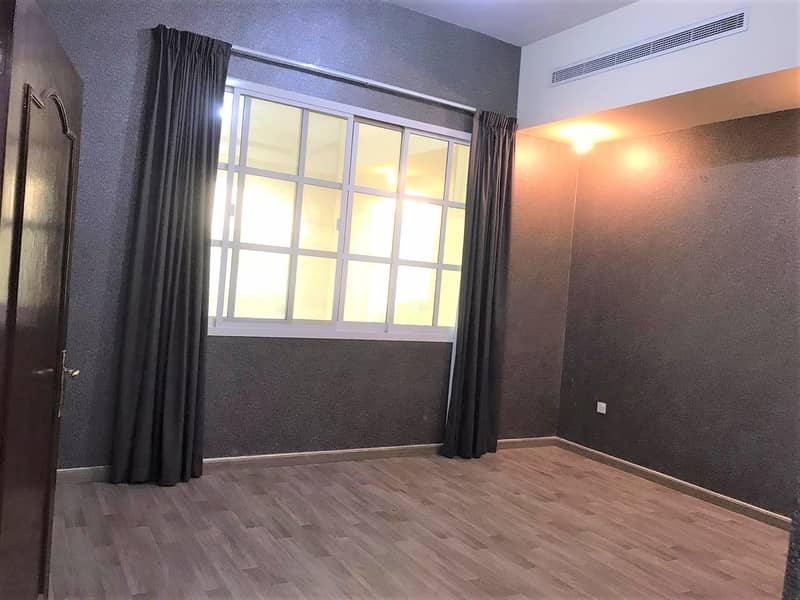 Elegant  Wall Paper Spacious One Bedroom at Ground floor with Balcony Garden View