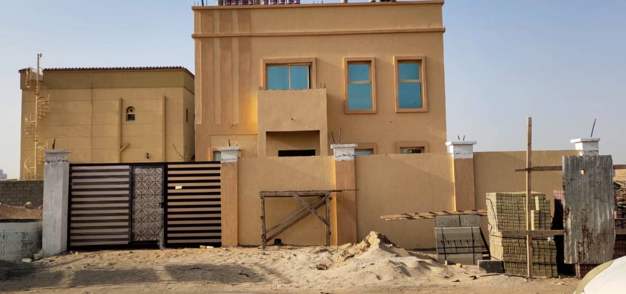 Directly on Sheikh Mohammed bin Zayed Street, the best villa in Ajman, fully finished and without notes with the possibility of freehold ownership in Ajman for all nationalities Entrance and exit very easy for Dubai and Sharjah