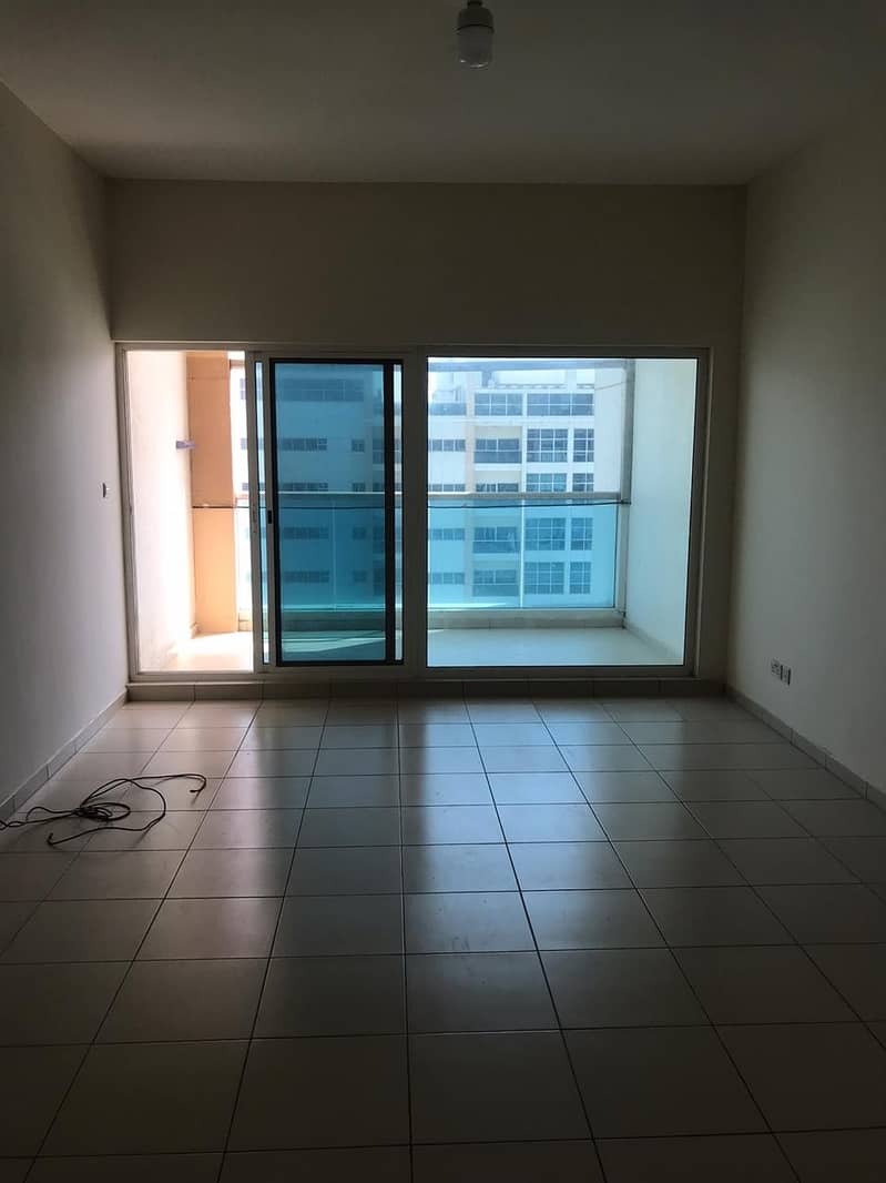 Apartment for rent in Ajman Towers, two rooms, a hall, 3 bathrooms + balcony, a very large area and a special location.