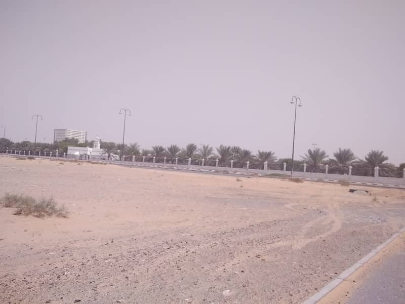 A plot of land in Al Rashidiya 2 . . Residential, commercial 933 sq. m. , a very vital site.