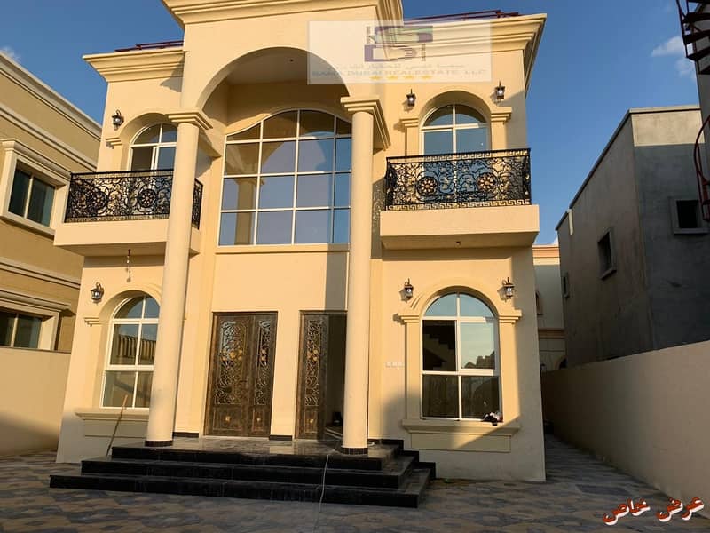 New villa near the main street, personal finishing, super quality, close to Sheikh Ammar Bridge directly