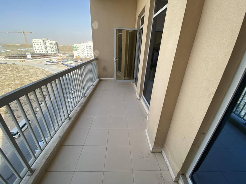 Closed kitchen studio // with bigger balcony// fully facilitated building// cheapest //  for  rent in phase 2 warsan 4