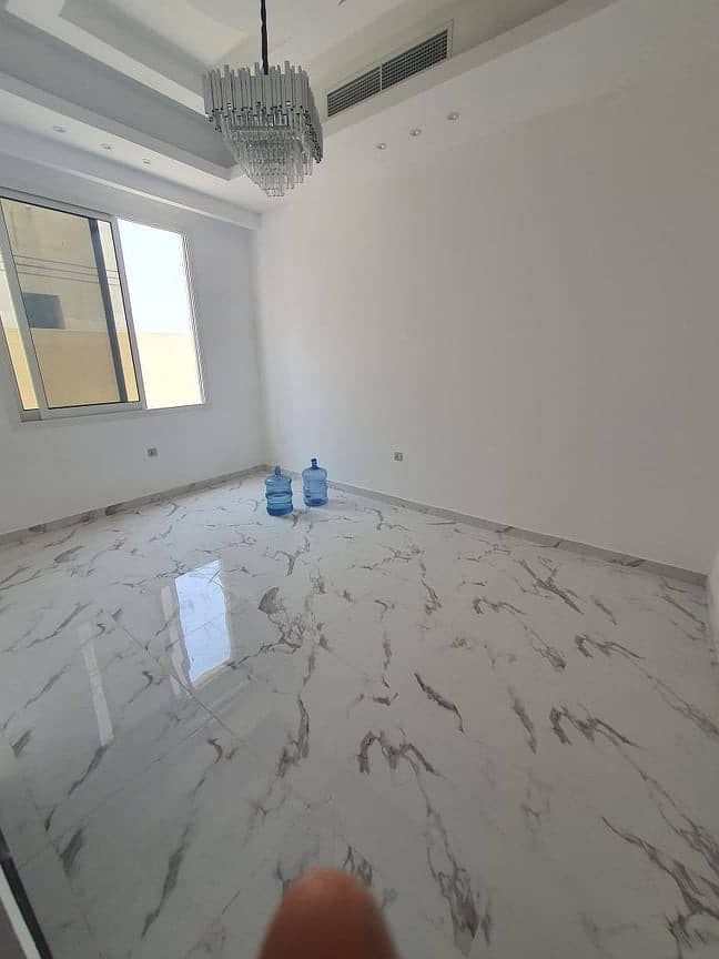 From the owner directly and at a price negotiable negotiable new personal building villa first inhabitant directly opposite the  superdelux finishes a prime location near Ajman academy and schools