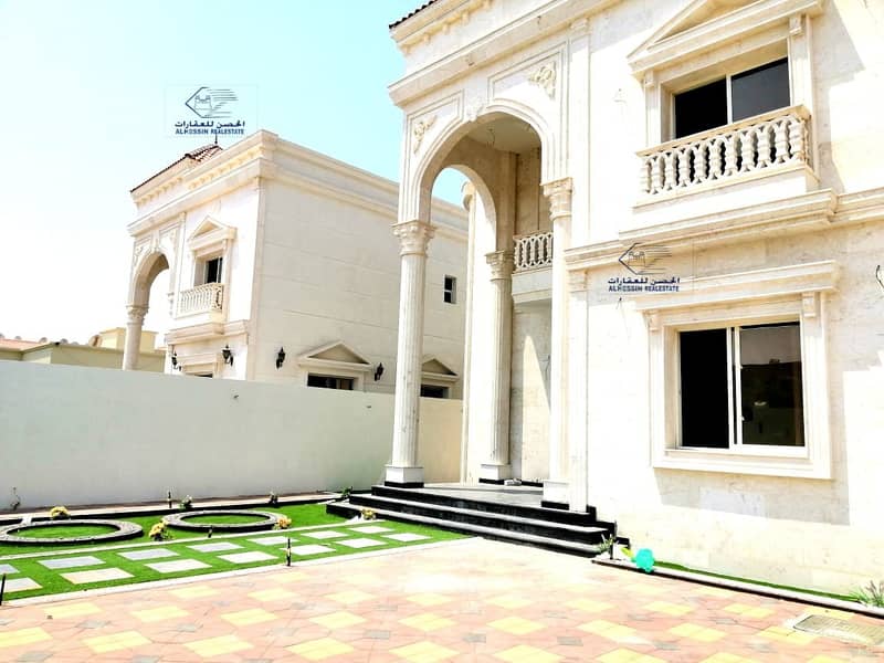 Luxurious Villa Classic Design in Perfect location . New villa with an area of 5000 in Ajman Al Rawda 2 for sale