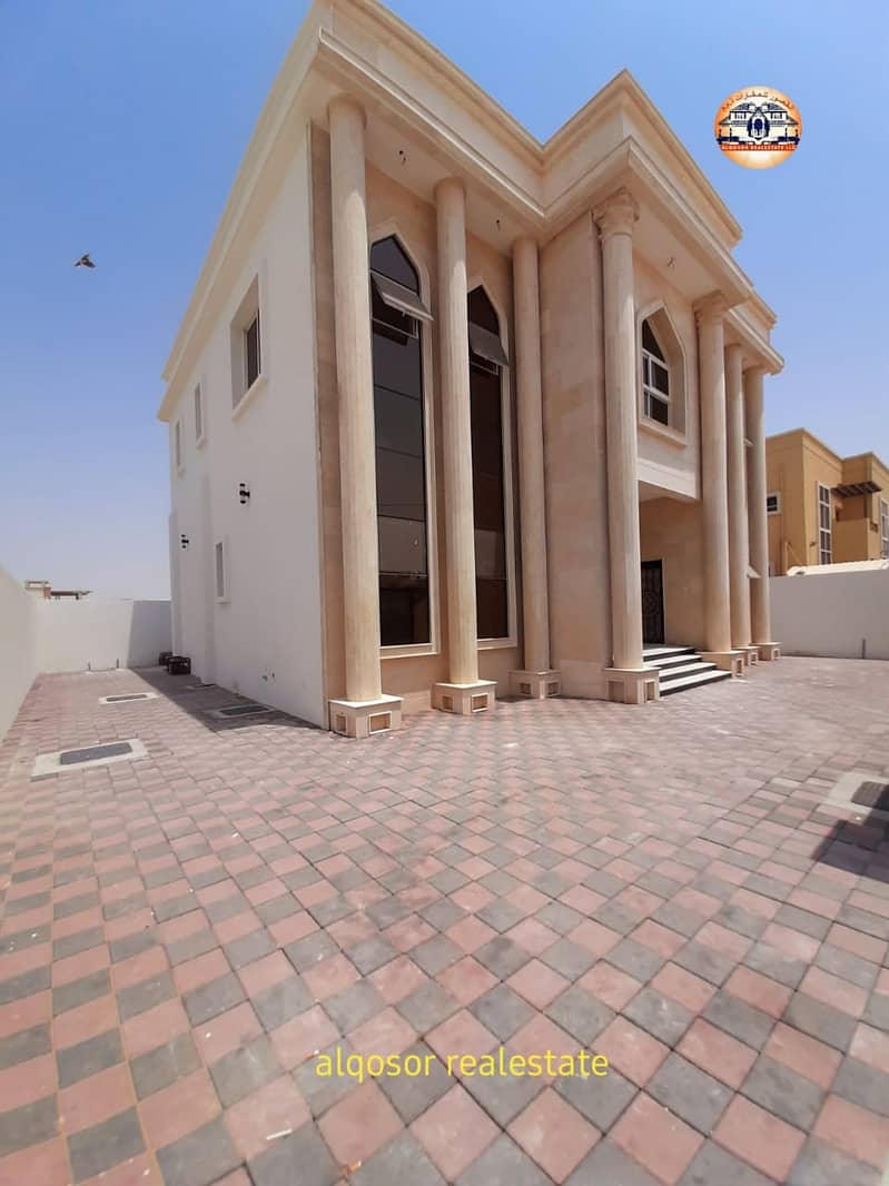 Villa for sale in Ajman, Al Rawda area, two floors, the point of stone, central air conditioning, super deluxe finishing, with the possibility of bank financing