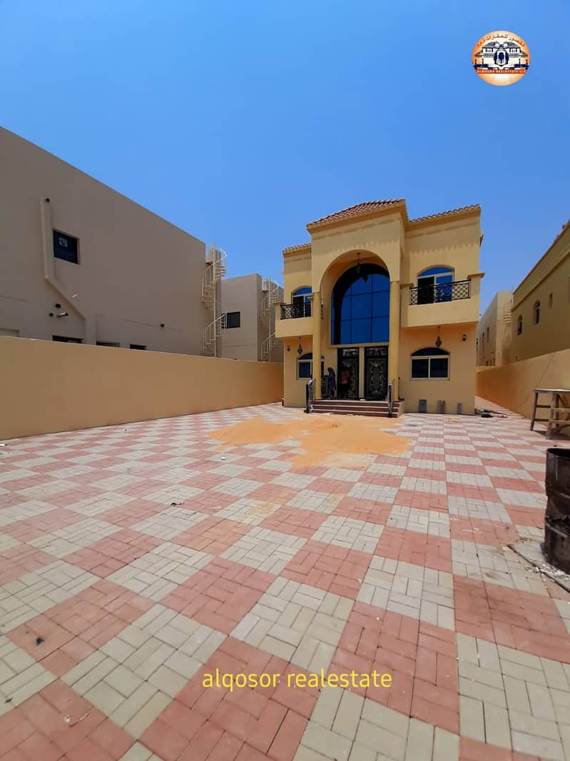 Villa for sale in Ajman, Al Mowaihat, two floors, super deluxe finishing with the possibility of bank financing