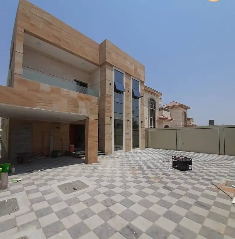 Exclusively from the owner directly and without an advance payment to the bank for sale, a villa with personal construction and finishing near the asphalt street in Al Mowaihat behind Al Hamidiyah Center near Emirates Road and Sheikh Mohammed Bin Zayed St