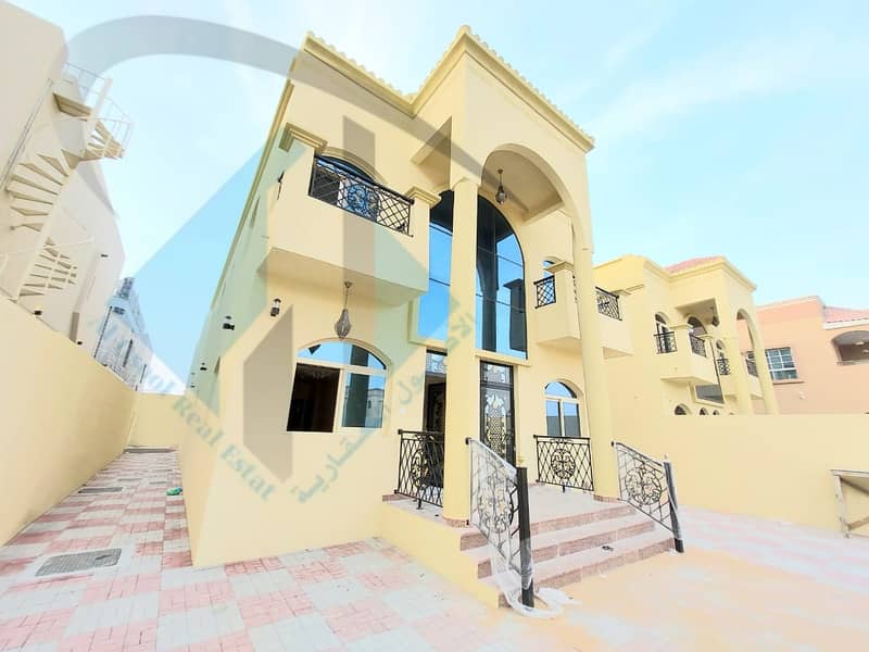 Villa for sale in Ajman, Al Mowaihat, two floors, super deluxe finishing with the possibility of bank financing