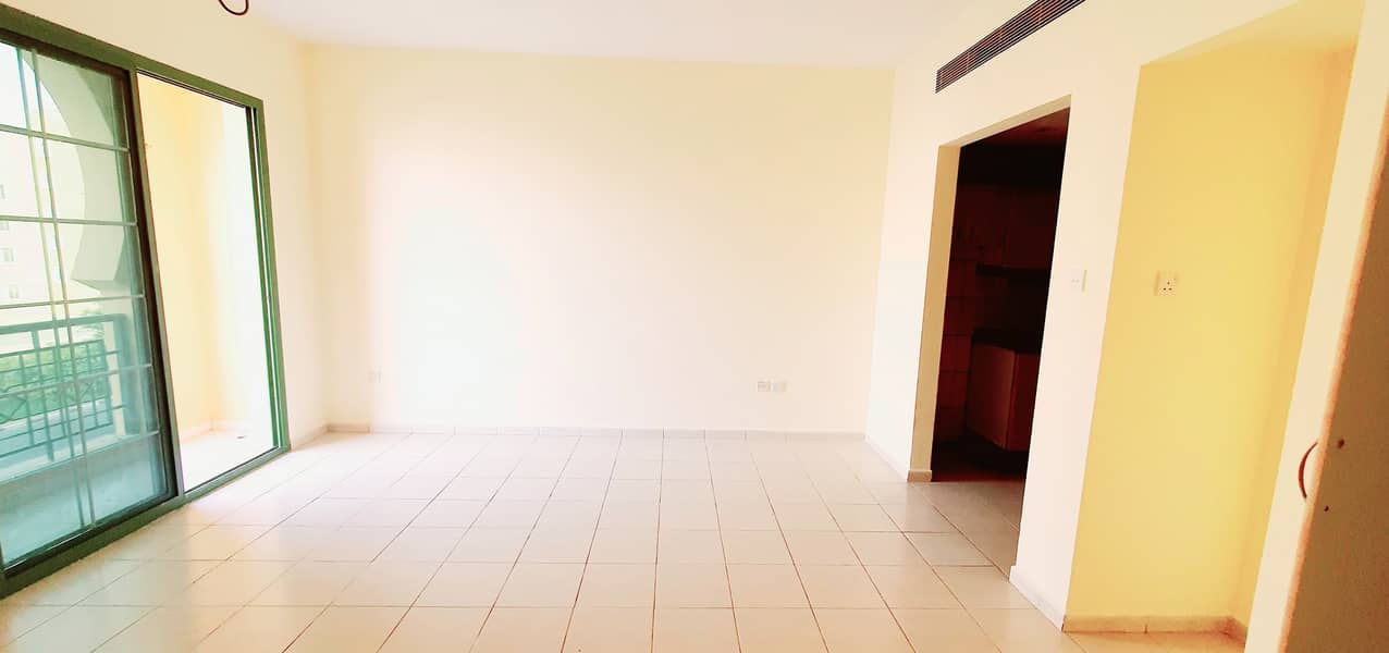 MOROCCO CLUSTER INTERNATIONAL CITY STUDIO FOR RENT WITH BALCONY ONLY 15,000 YEARLY