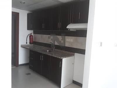 STUDIO WITH BALCONY AND PARKING IN SILICON OASIS