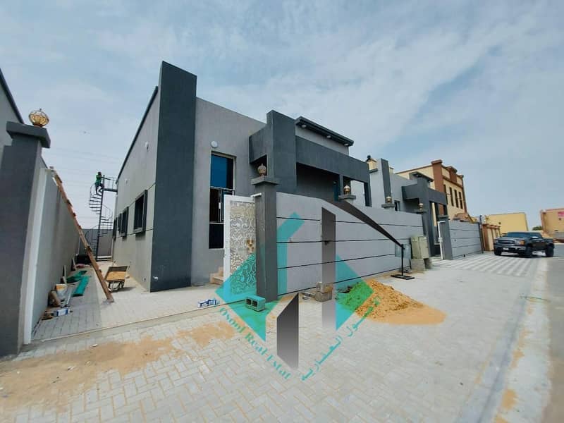For sale a villa in Ajman on a running street at a very excellent finishing shot price without initial payment and in monthly installments for 25 years with a large bank indulgence