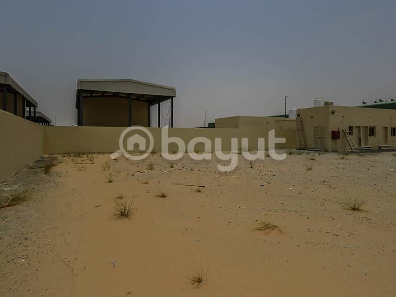LAND WITH   OFFICES AVAILABLE FOR RENT IN AL HANOO AREA SAJAA