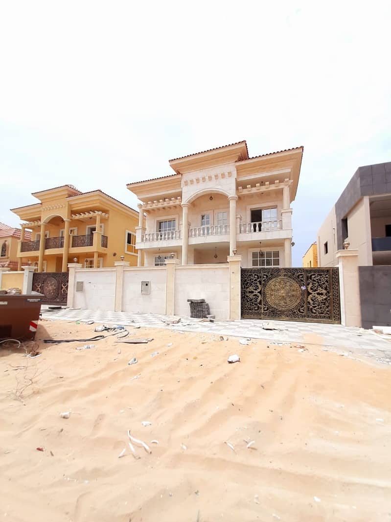Villa for sale in Ajman, the Rawda area, two floors, super deluxe finishing, with the possibility of bank financing