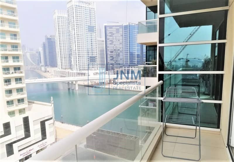 Spacious 1BR Apartment with Partial Canal View