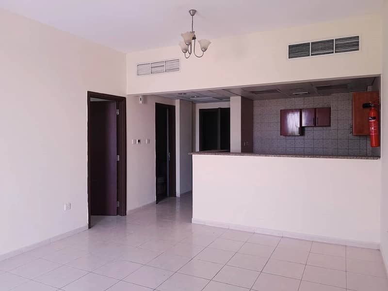 EMIRATES CLUSTER  l ONE BEDROOM WITH BALCONY FOR  RENT ONLY IN 24000/-