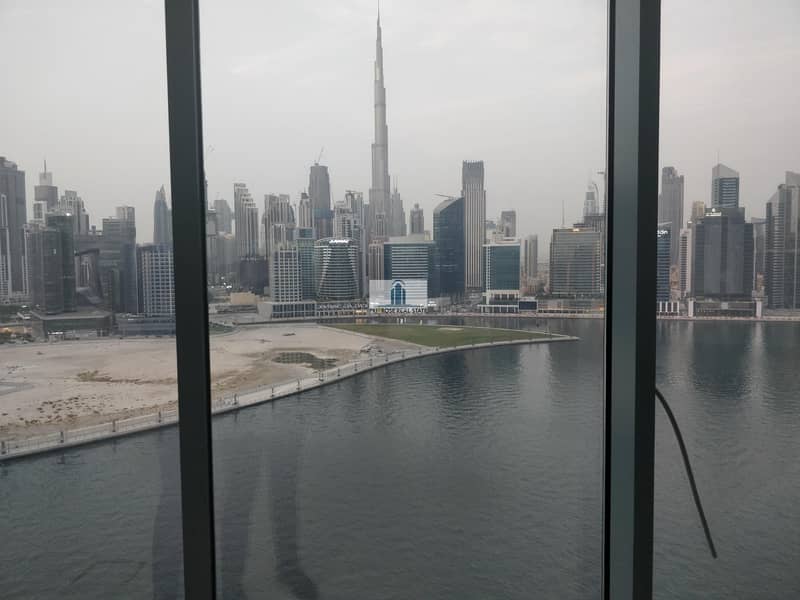 4 PARKINGS | Best Unit of the Building | Partitioned only | MASSIVE Panoramic Views Burj + Canal