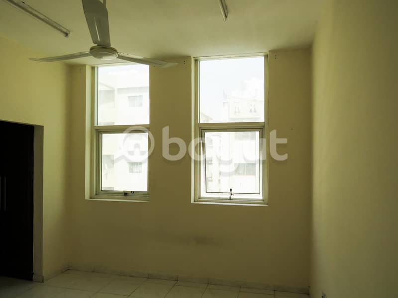 For rent in Ajman Al Nuaimia, a room and a hall, a large area, available in the corner of a building, we add very much