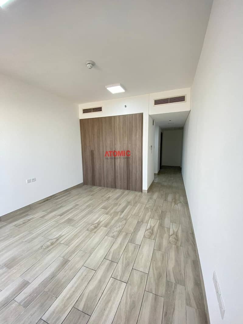 Luxury closed kitchen large studio with balcony for rent in Warsan4-01