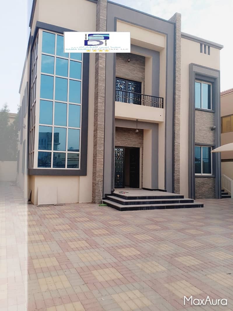 Villa for sale in Ajman, Al Rawda area, modern design, super deluxe finishing, with the possibility of bank financing