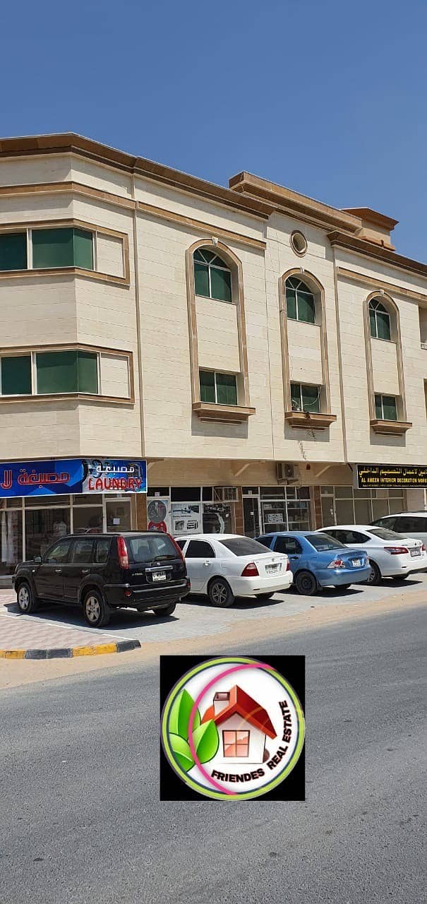 Building for sale in Ajman Corner and on Qar Street, below the market price