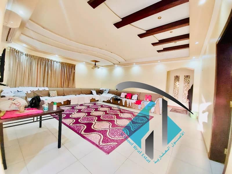 For sale, a villa in Ajman connected to electricity and water with air conditioners at a price of a snapshot without a down payment and on monthly installments for a period of 25 years with a large bank indulgence