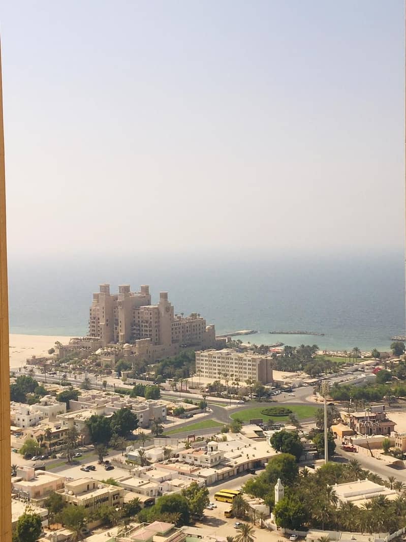 2 bhk partial sea view with parking for rent in Ajman one tower
