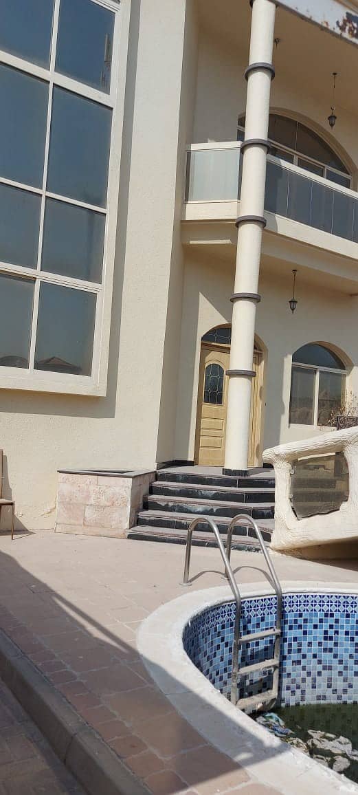 Doube story 4 bedroom hall villa for rent in Al Rifah + Swimming pool