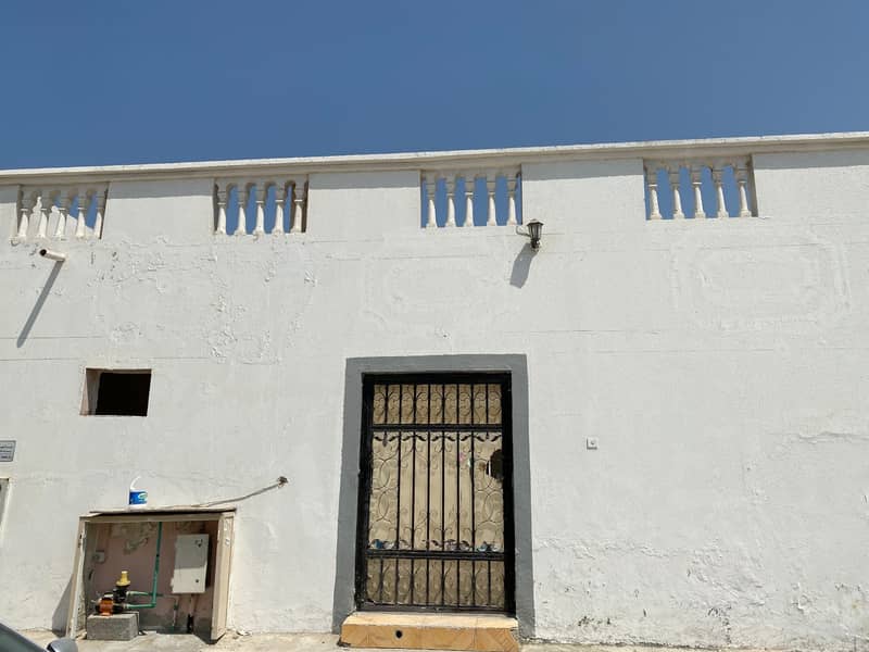 Clean Arabic house at  cheap price in Al Ghafia