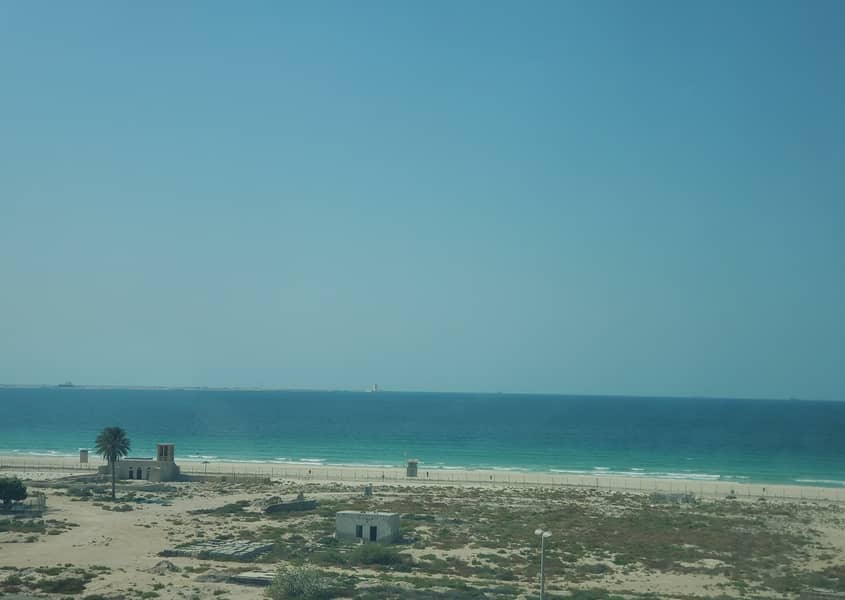 Sea view studio only 17000 near al khan beach 6 cheques