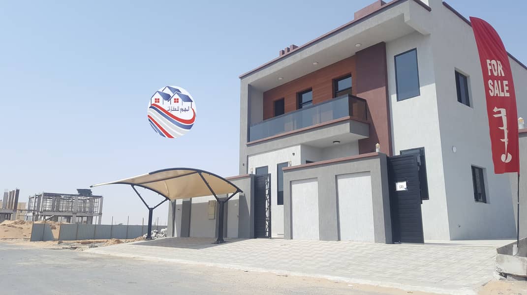 Villa for sale, personal finishing, excellent price, Ajman, close to the main street, a large building area