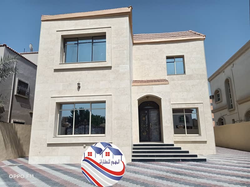 Villa for sale with stone facade and personal finishing with water and electricity