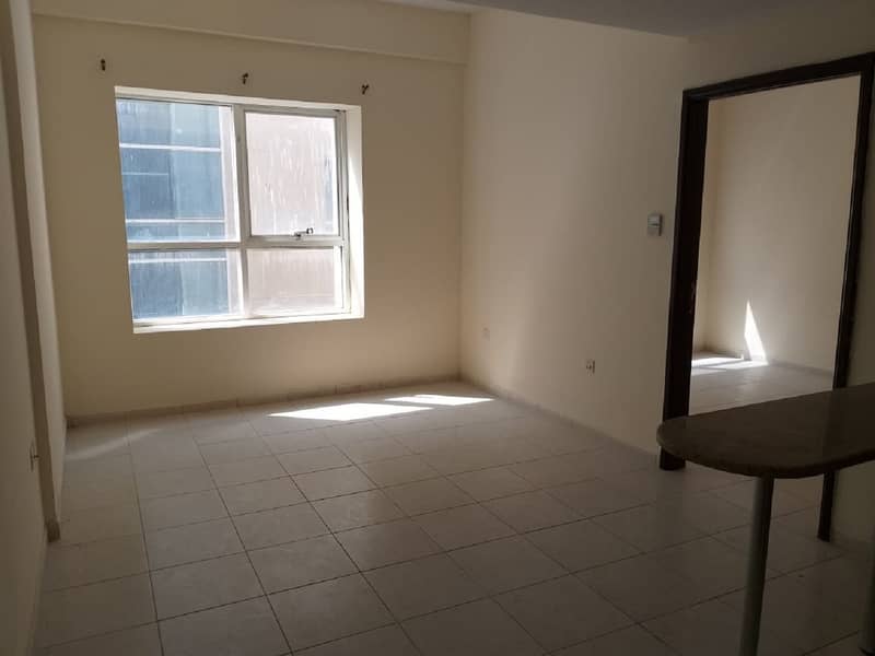 1 Bedroom Hall AED 13,000 in Almond Towers Garden City