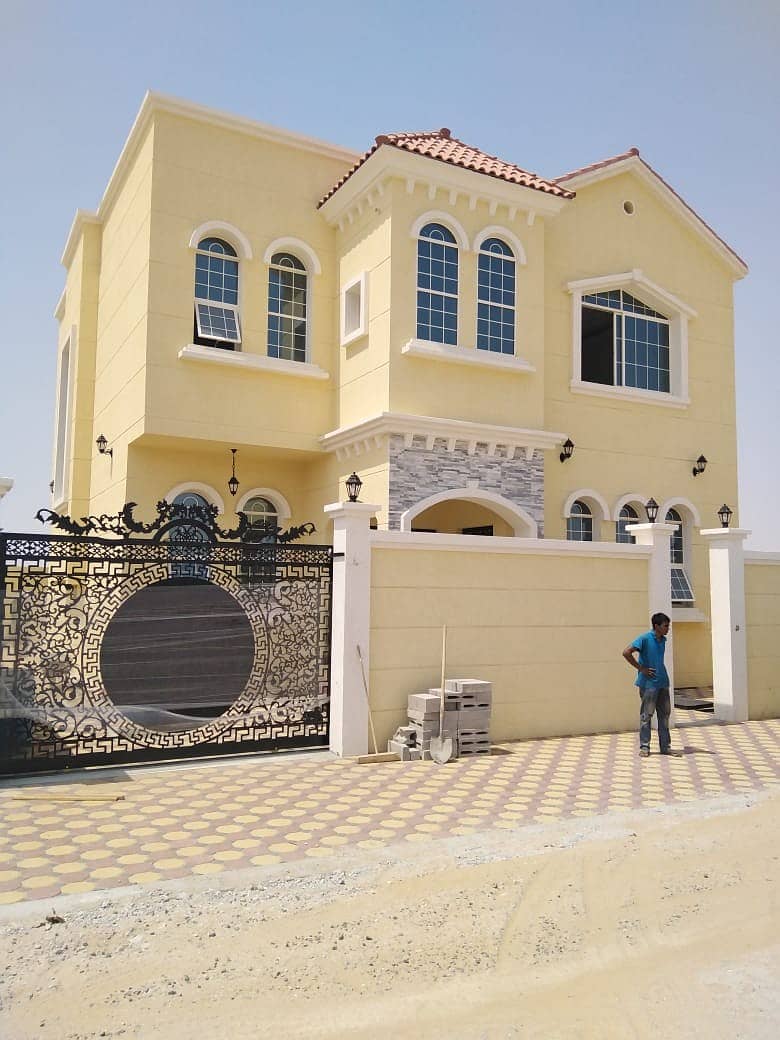 A personal building and finishing villa with a luxurious hotel design with very large room sizes, an artist's site, and a special price from the owner near Emirates Road with free ownership for life for all nationalities