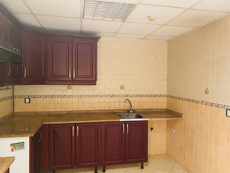 AED 28K plus 1 Month Free! Unfurnished  studio apartment w/balcony