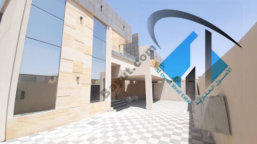 For sale villa in Ajman on a residential, commercial, European street, with monthly installments for a period of 25 years, with a large bank leniency