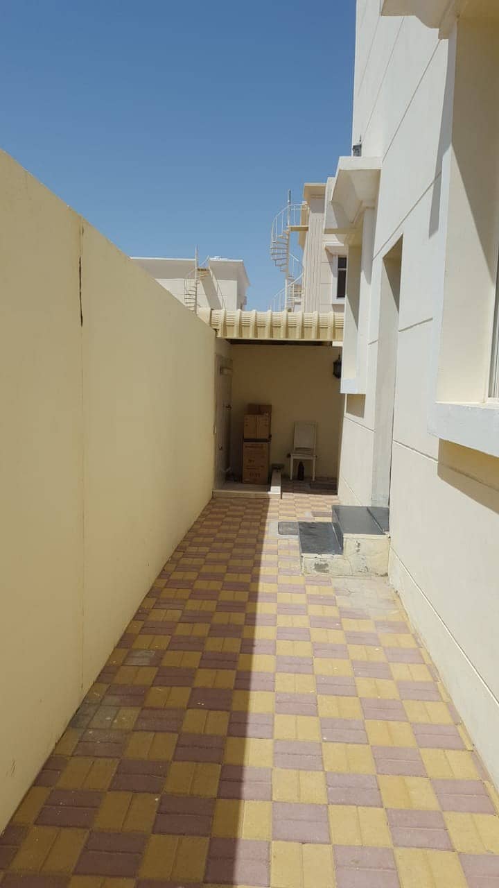 A very clean second resident villa in the Jasmine area with air conditioners near the asphalt street