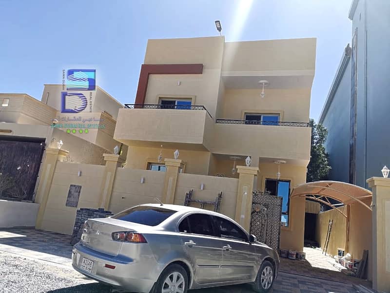 For sale a villa decorated in a modern style and covered with Galala stone in Al Mowaihat, super deluxe finishing and a very good location near all services