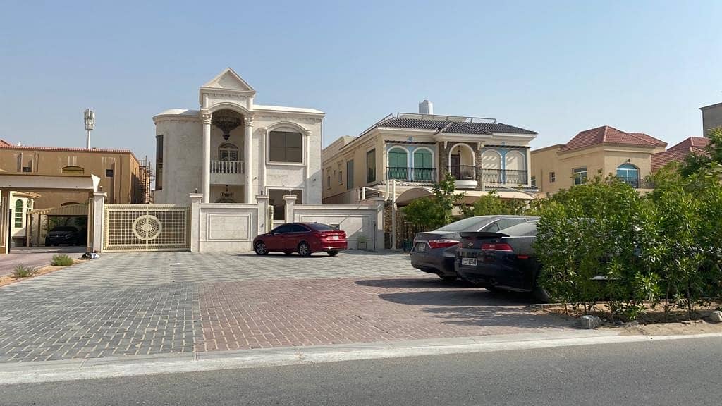 brand new commiracal villa for sale in ajman with eletracity