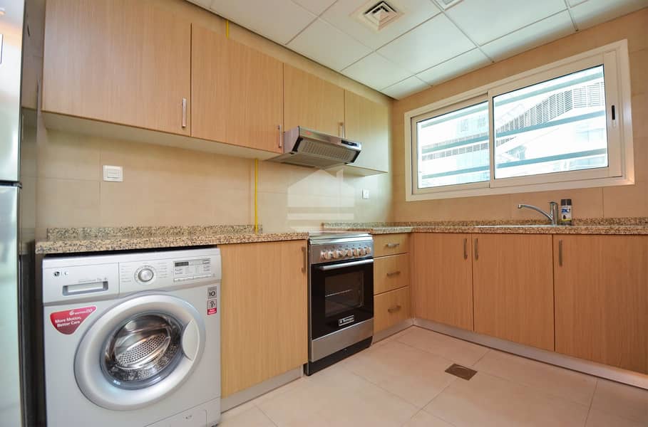 Business Bay  apartment equipped Kitchen and Balcony