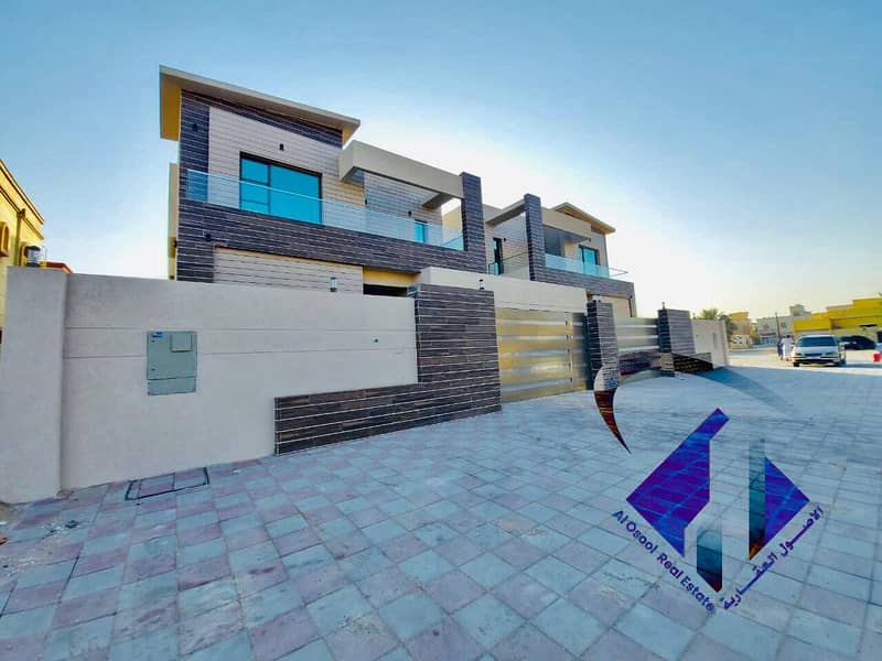 For sale, a villa in Ajman, a second piece of Sheikh Ammar Street, very excellent finishing without a down payment and on monthly installments for a period of 25 years with a large bank credit