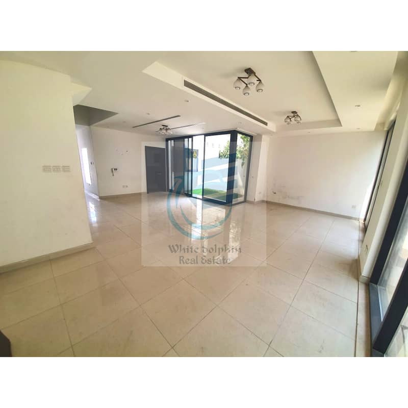 WELL MAINTAINED I HIGH QUALITY 4 BED ROOM VILLA IN A MASSIVE COMMUNITY WITH PRIVATE ENTRANCE I   SHARED POOL I GYM I STORE AND LAUNDRY ROOM I BALCONY I PVT BACKYARD I TWO COVERED PARKING I MAID'S ROOM OUTSIDE I  AWAY FROM FLIGHT PATH I SECURITY 24/7 FOR J