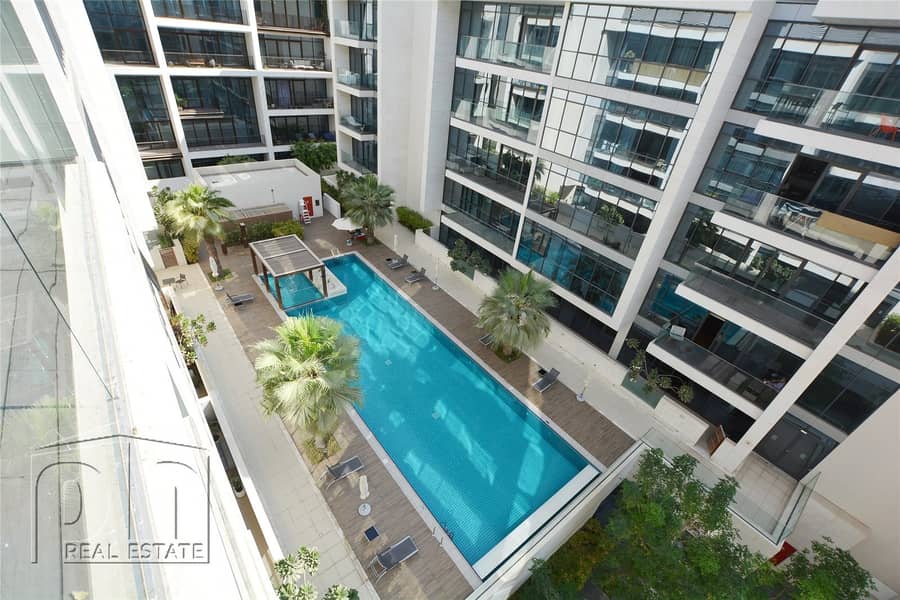 Large Balcony | Pool View | 2BR + Maid