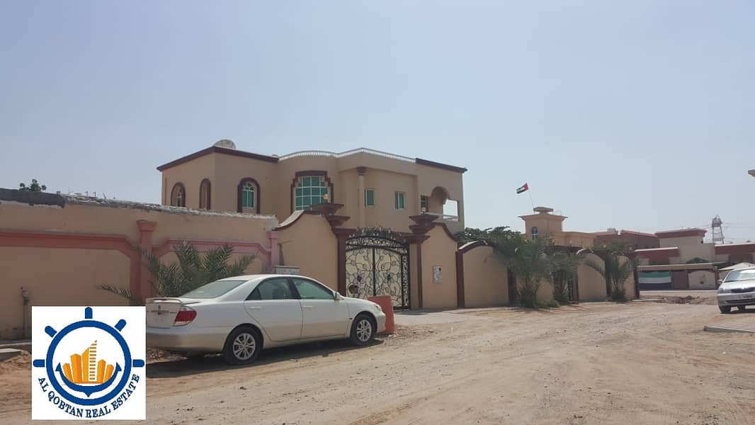 Villa for sale, a large area of 6400 feet, in Al Mowaihat area, Ajman