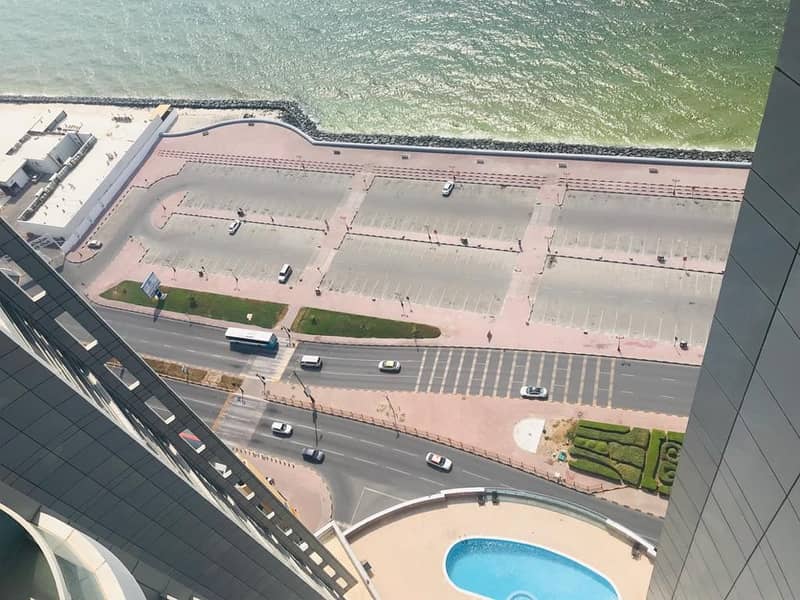 Full Seaview !! 2 BHK Flat with Private Parking for Sale in Corniche Towers, Ajman
