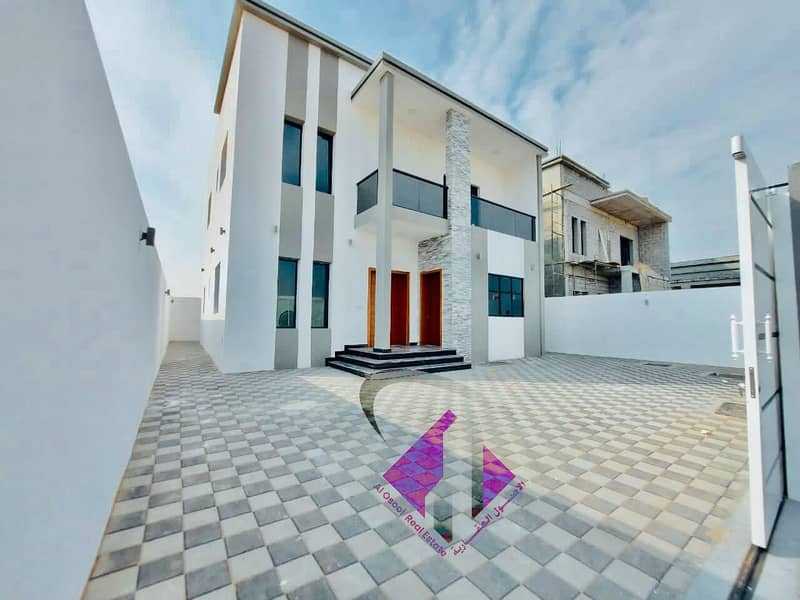 For sale, a modern villa in Ajman, central air conditioning, on a neighboring street, an area of large monsters, for a free shot price, for life for all nationalities.